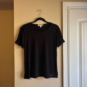 Black top with cutout sleeves